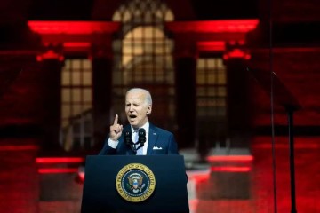 Tyrannical Joe Biden with red background